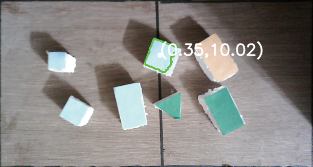 Computer Vision Based Robotic Arm Controlled Using Interactive GUI